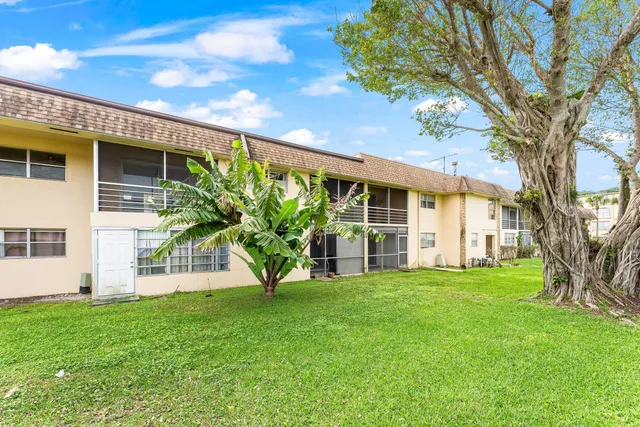 a view of swimming pool with outdoor seating