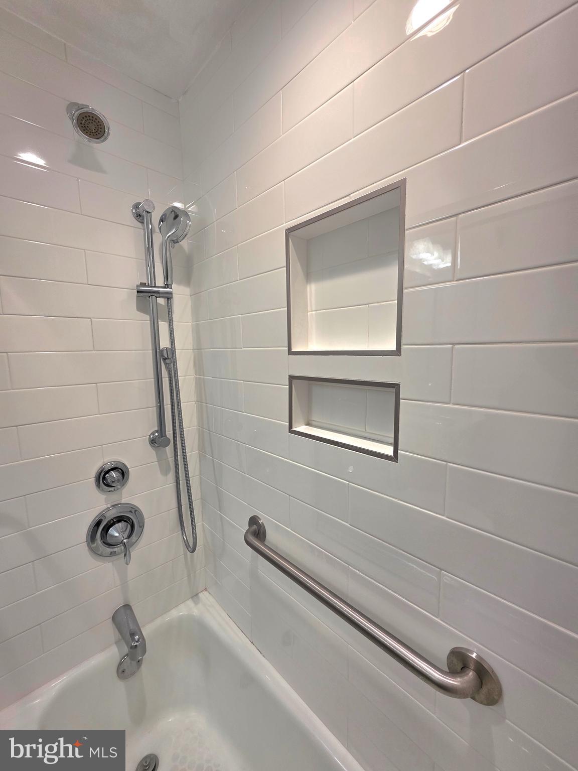 2059 Huntington Avenue, Unit 312 Alexandria, VA 22303 - Photo 18 of 33 a bathroom with a shower