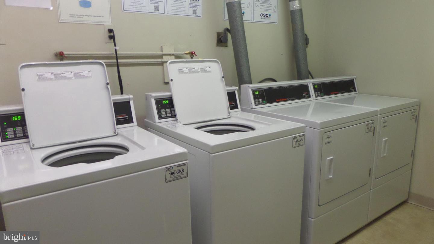 2059 Huntington Avenue, Unit 312 Alexandria, VA 22303 - Photo 26 of 33 a utility room with dryer and washer