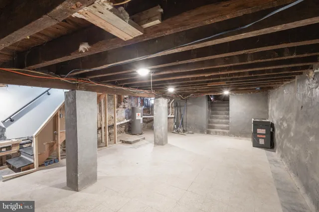 a view of an empty room with wooden roof