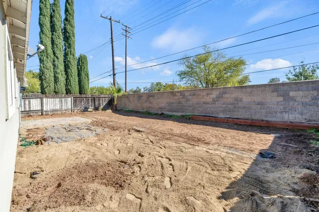 an aerial view of house with yard