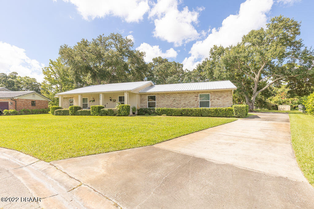 355 Tulip Tree Lane Ormond Beach, FL 32174 - Photo 2 of 40 003A0649