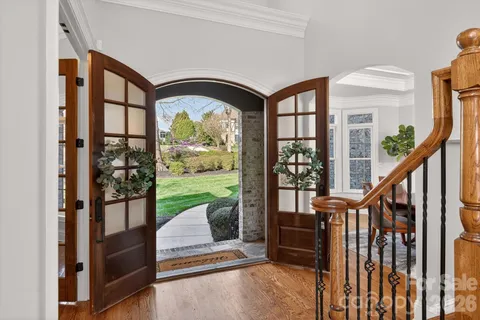 a view of a backyard with a patio and outdoor seating