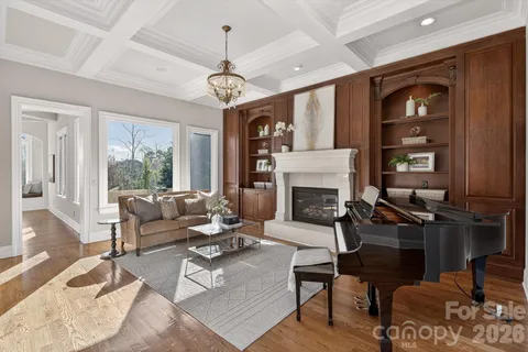 a view of a backyard with plants and a garden