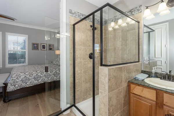 a bathroom with a sink and a mirror