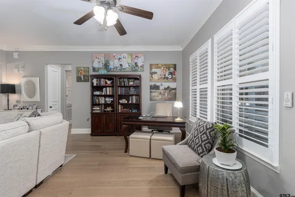 a living room with furniture and decor