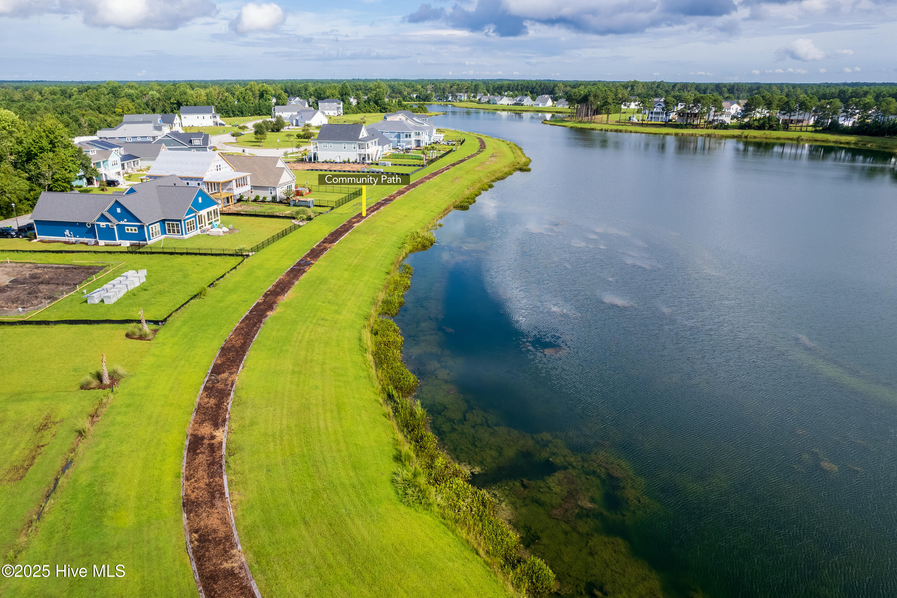 155 Everett Park Trail Holly Ridge, NC 28445 - Photo 35 of 51 (Upload-from-mobile-1762517851)lake-walk