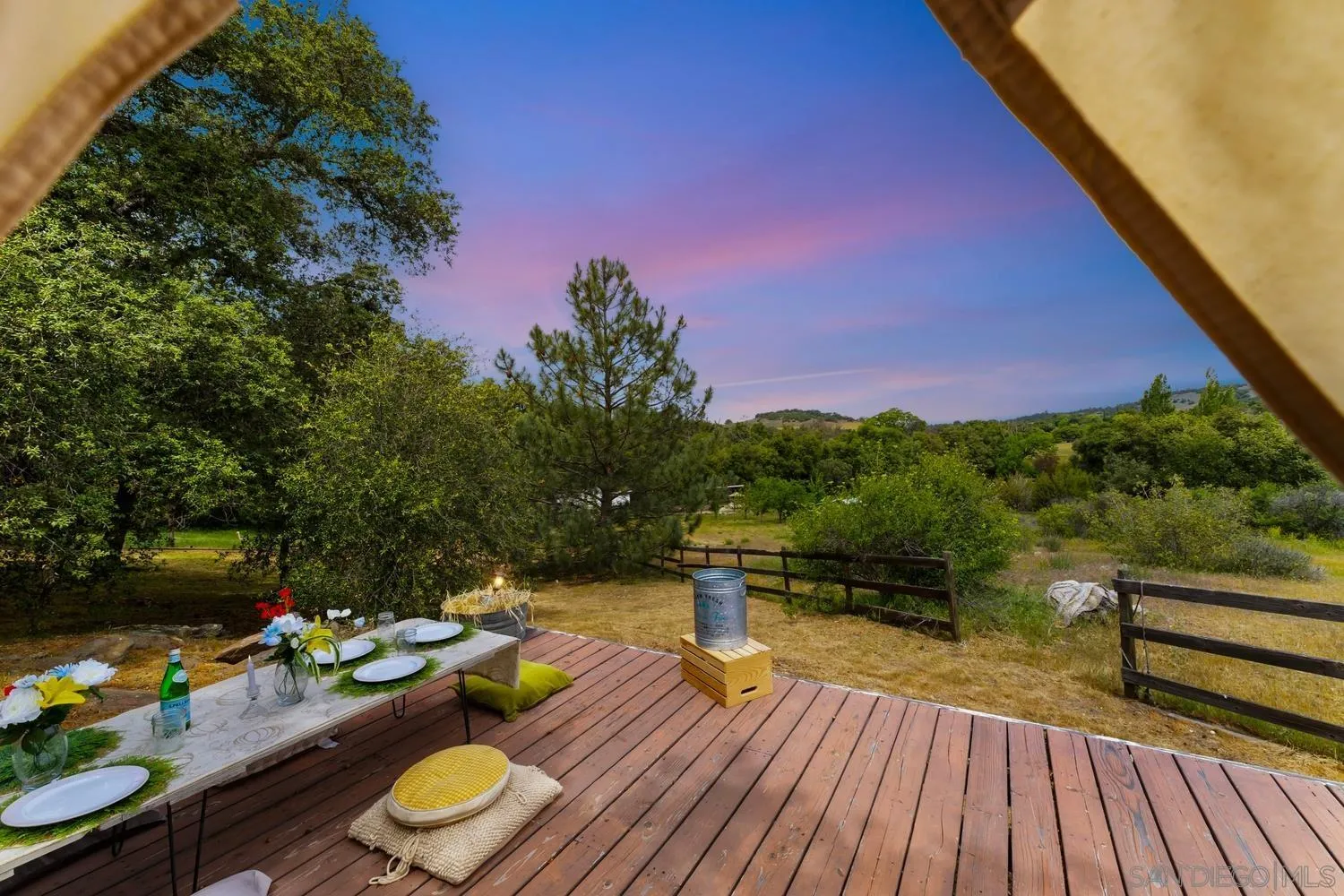 3517 Deer Lake Park Road Julian, CA 92036 - Photo 58 of 75 a view of a balcony with chairs and wooden floor