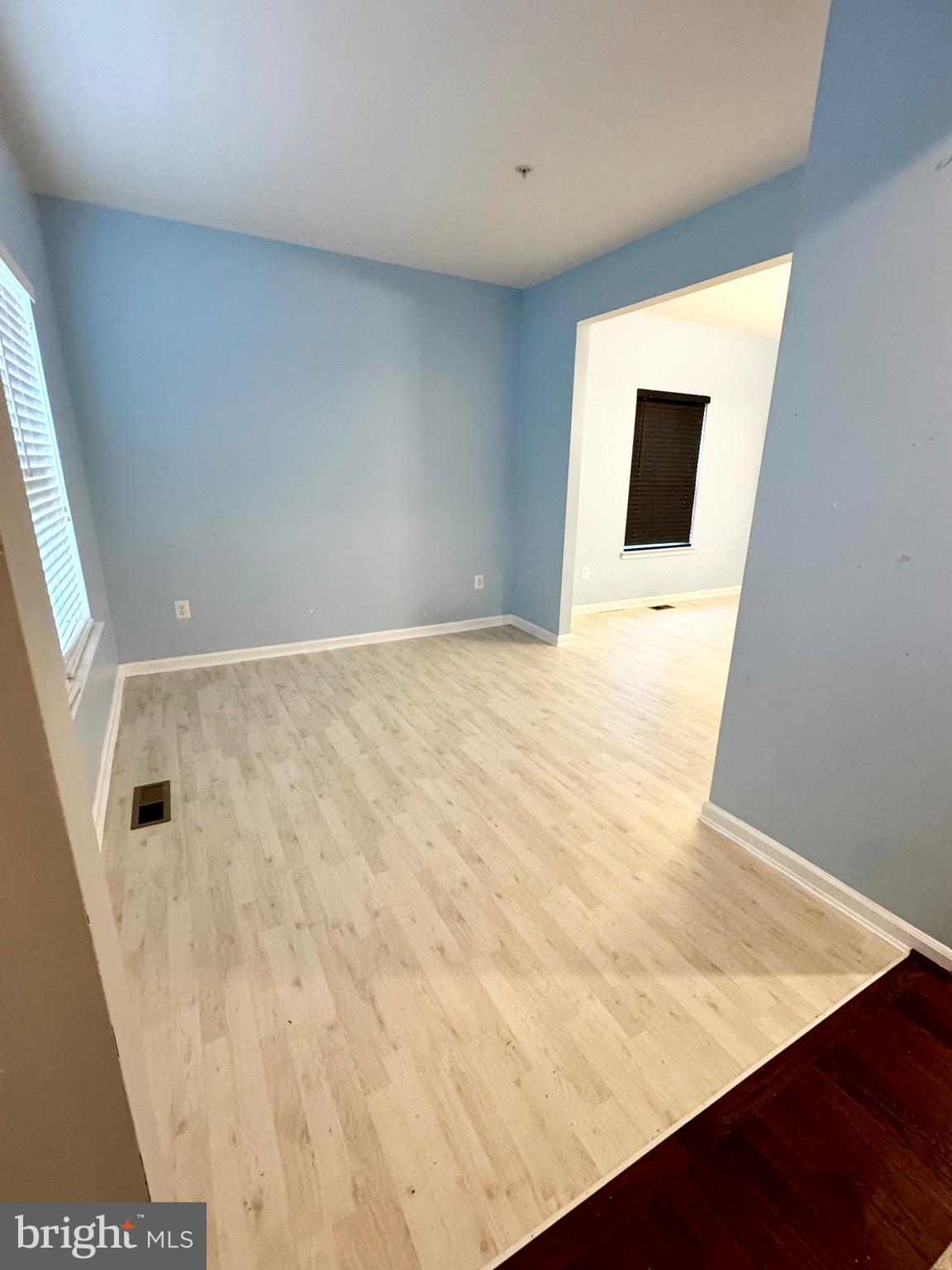 2223 Argonne Drive Havre de Grace, MD 21078 - Photo 11 of 29 a view of an empty room with wooden floor and a window