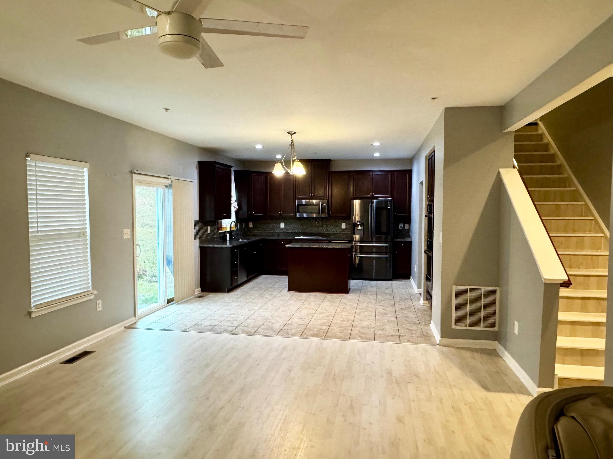 2223 Argonne Drive Havre de Grace, MD 21078 - Photo 4 of 29 a view of kitchen with kitchen island wooden floor center island and stainless steel appliances