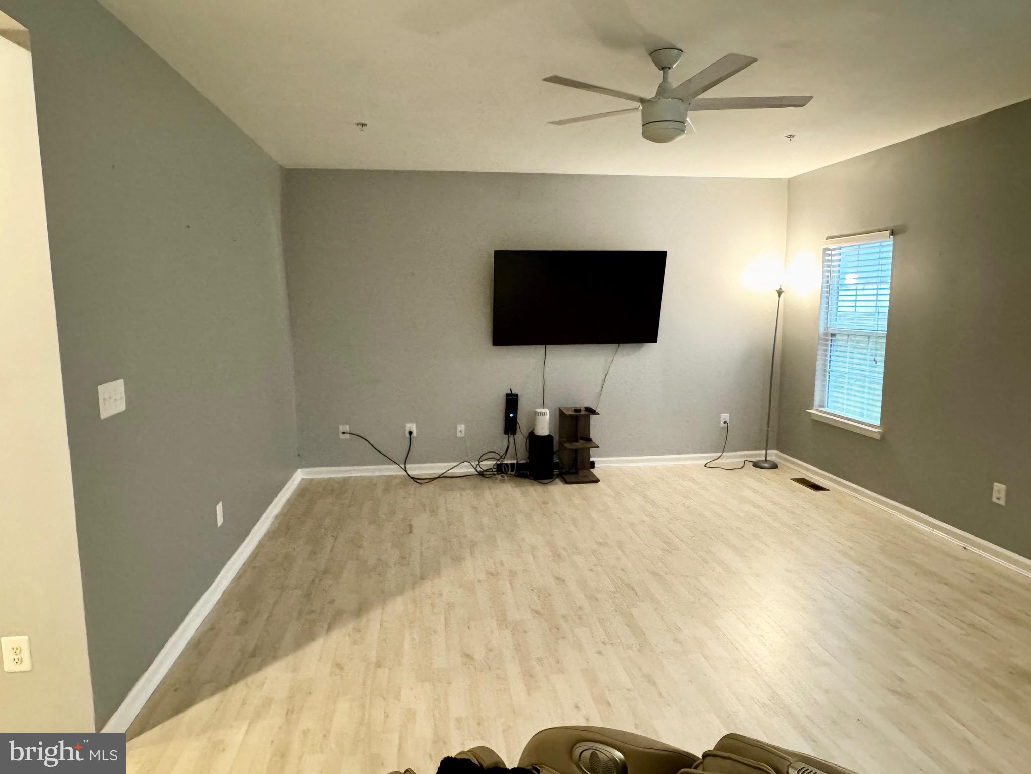 2223 Argonne Drive Havre de Grace, MD 21078 - Photo 8 of 29 a bedroom with a bed and a flat screen tv