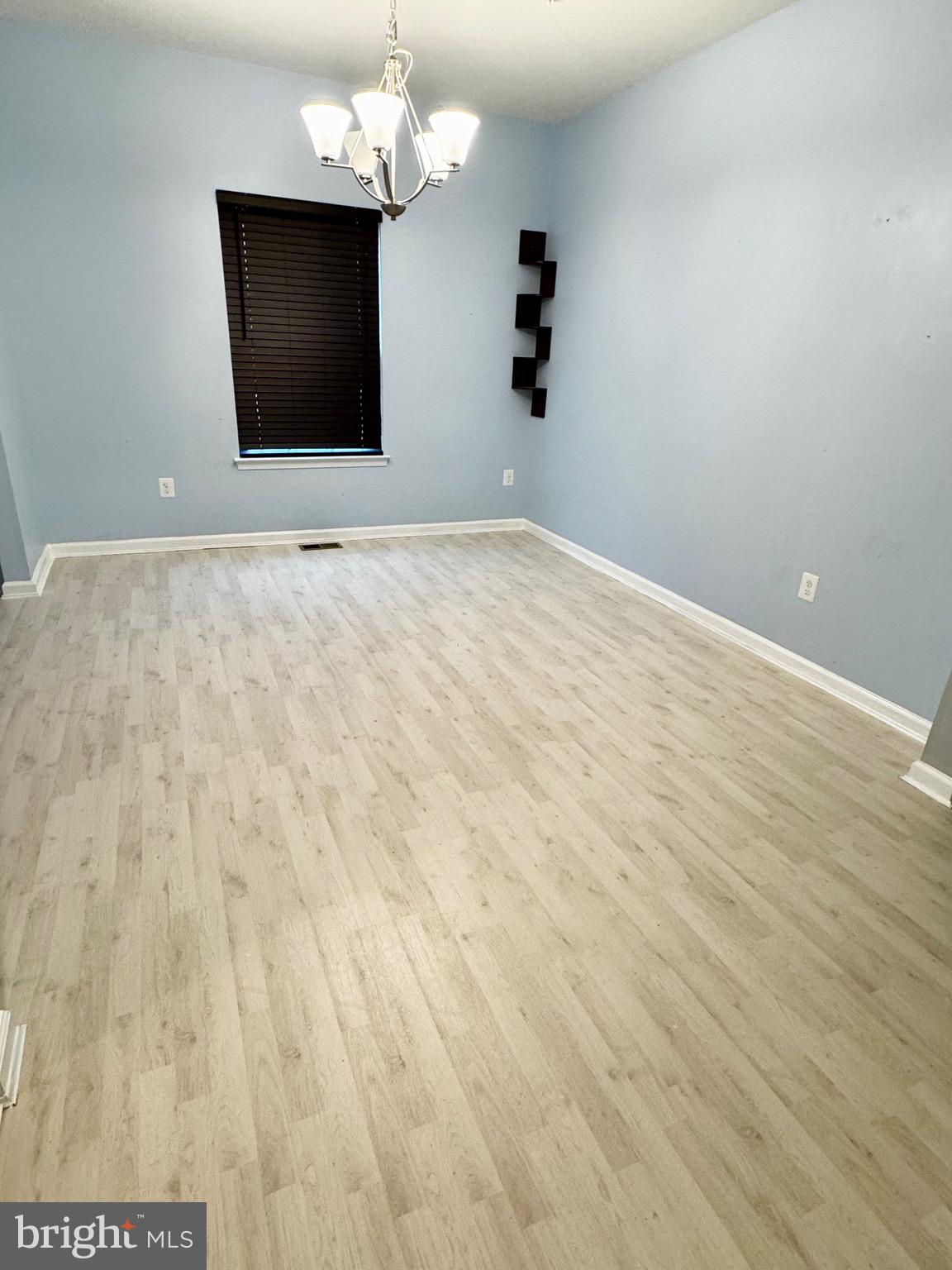 2223 Argonne Drive Havre de Grace, MD 21078 - Photo 9 of 29 a view of a livingroom with a chandelier fan and wooden floor