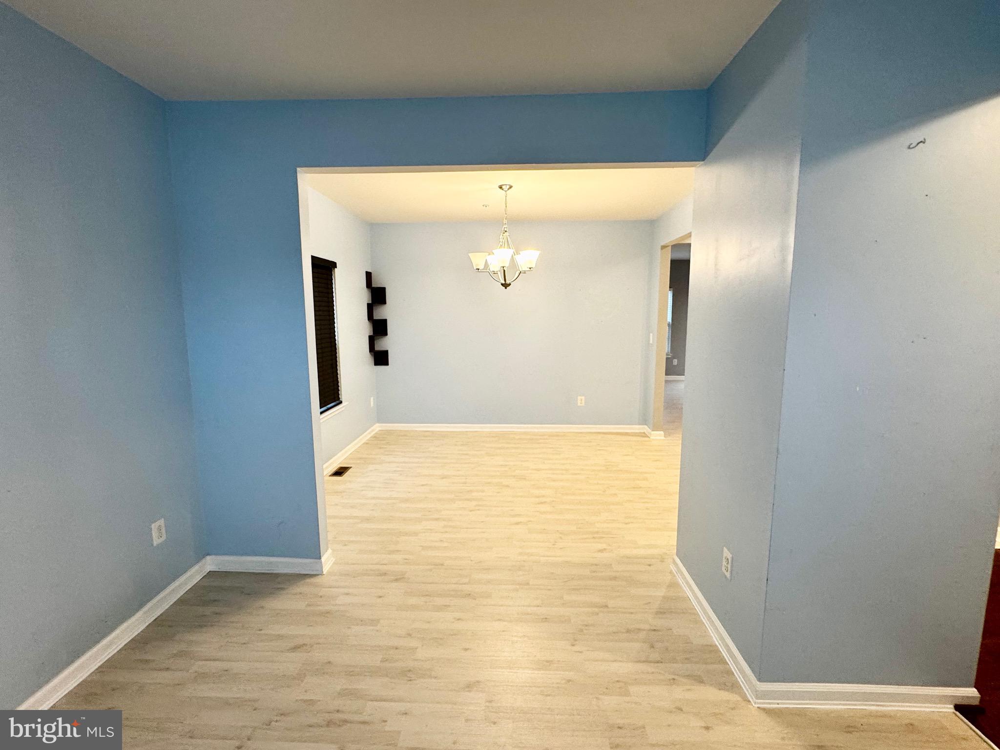 2223 Argonne Drive Havre de Grace, MD 21078 - Photo 10 of 29 a view of a hallway with wooden floor