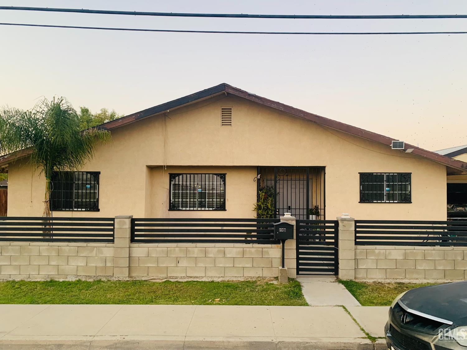 Undisclosed Address Delano, CA 93215 - Photo 2 of 14 a view of a house with a balcony