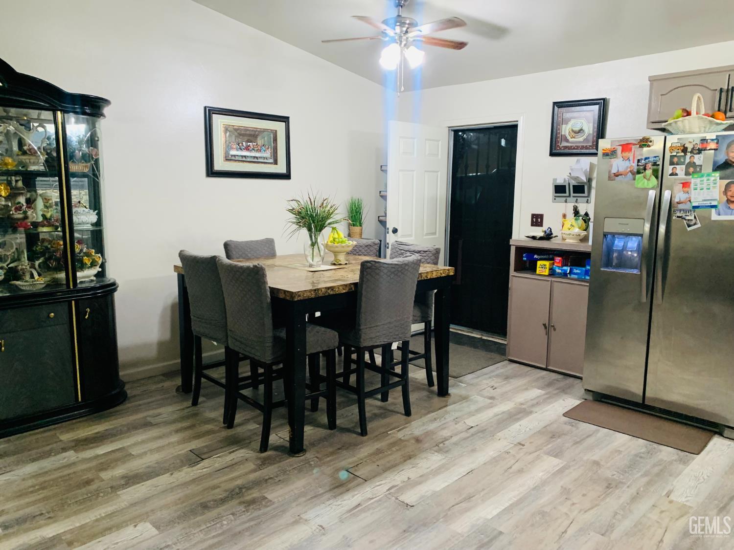 Undisclosed Address Delano, CA 93215 - Photo 8 of 14 a view of a dining room with furniture