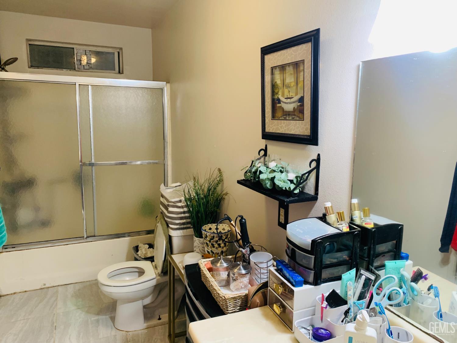 Undisclosed Address Delano, CA 93215 - Photo 10 of 14 a living room with furniture and a potted plant