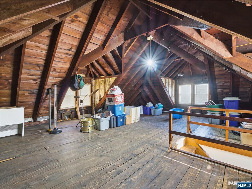 768 East 25th Street Paterson, NJ 07504 - Photo 29 of 29 a view of an empty room with wooden floor