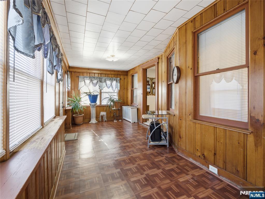 768 East 25th Street Paterson, NJ 07504 - Photo 10 of 29 a living room with furniture and a large window