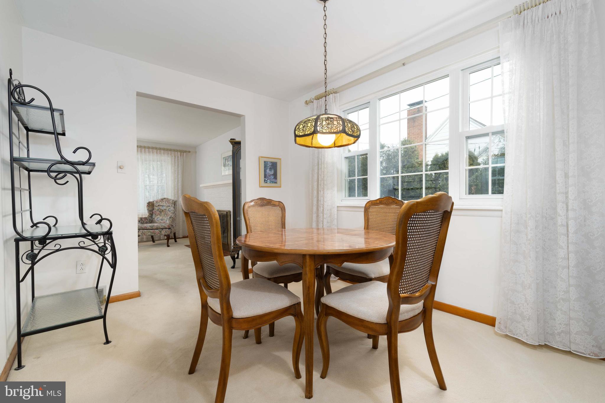 3881 Elder Road Harrisburg, PA 17111 - Photo 12 of 34 a view of a dining room with furniture and chandelier