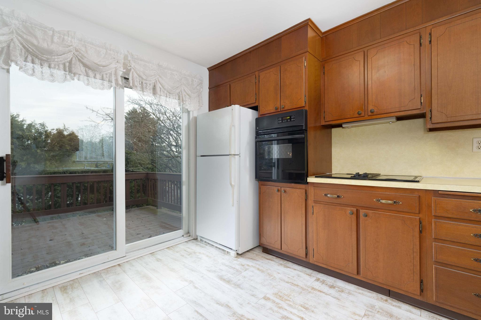 3881 Elder Road Harrisburg, PA 17111 - Photo 14 of 34 a kitchen with stainless steel appliances granite countertop a refrigerator and cabinets