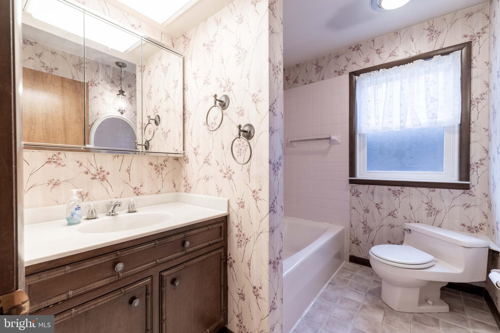 3881 Elder Road Harrisburg, PA 17111 - Photo 18 of 34 a bathroom with a sink and a mirror