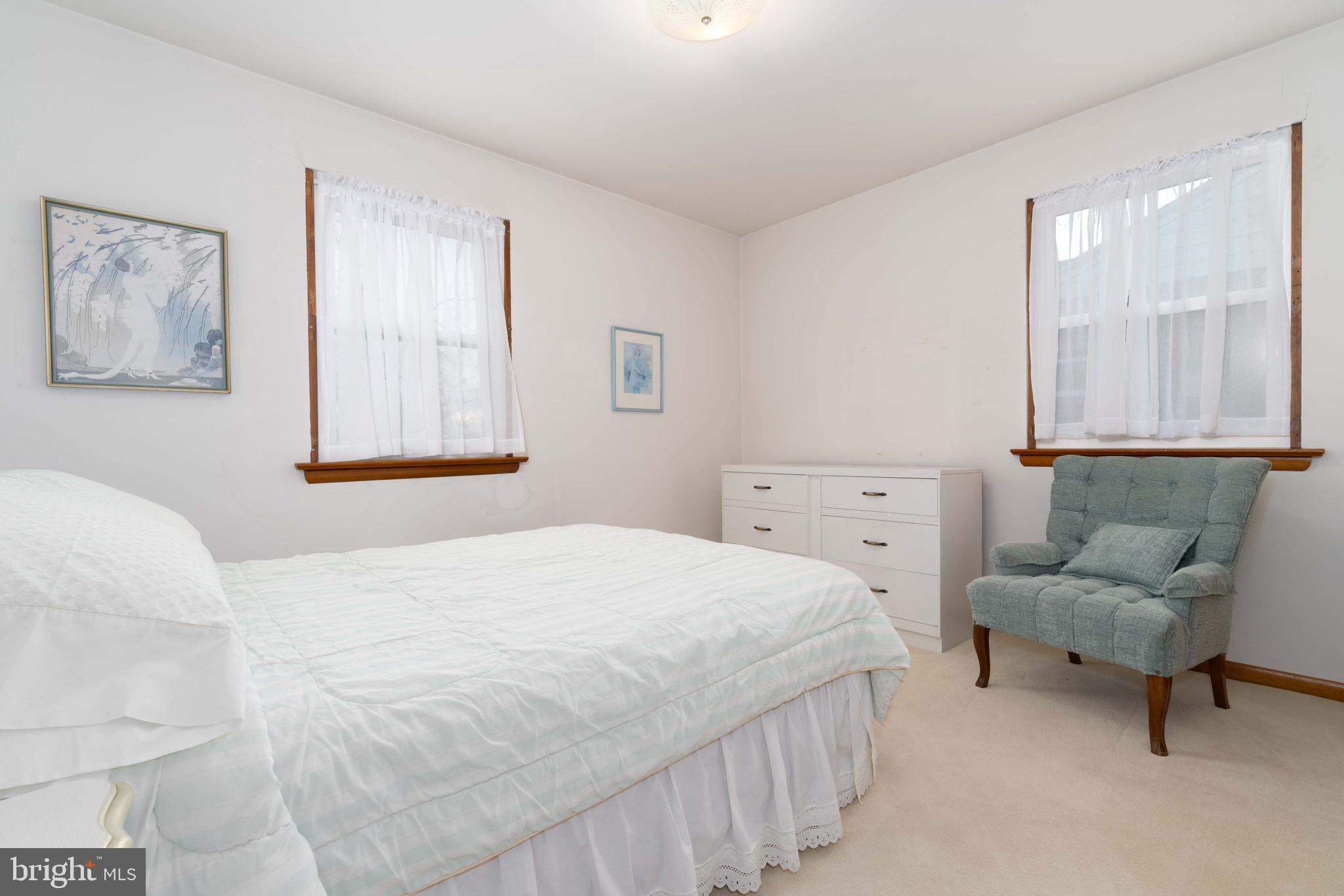 3881 Elder Road Harrisburg, PA 17111 - Photo 20 of 34 a bedroom with a bed and a couch