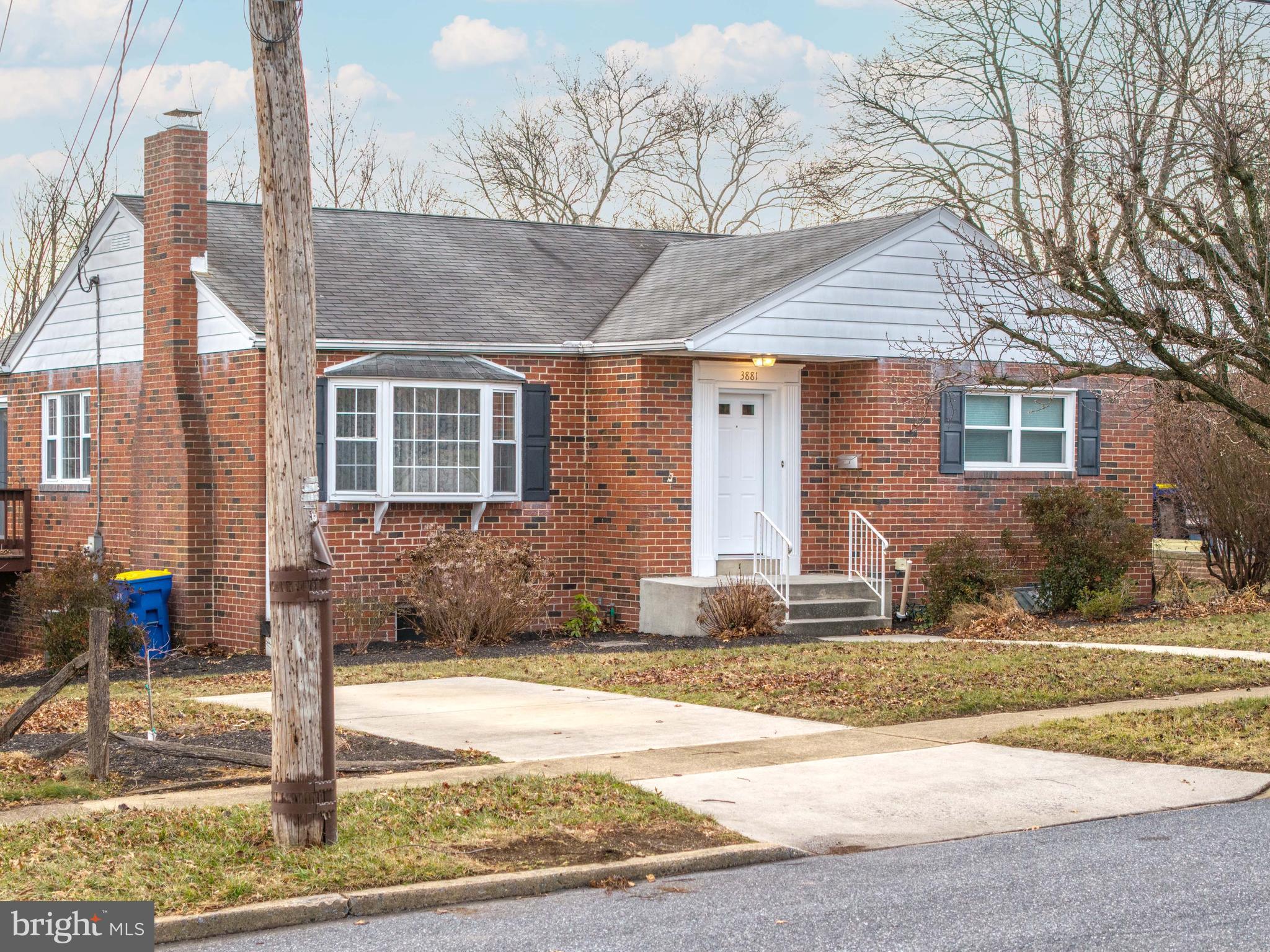 3881 Elder Road Harrisburg, PA 17111 - Photo 2 of 34 a front view of a house with street