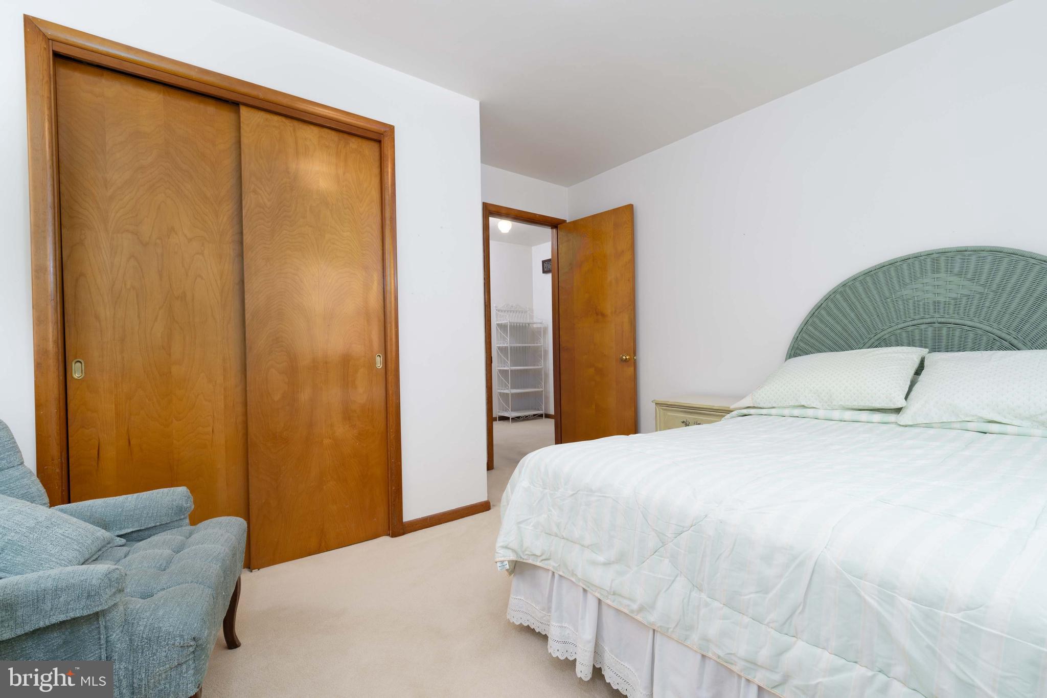 3881 Elder Road Harrisburg, PA 17111 - Photo 21 of 34 a bedroom with a bed and a couch