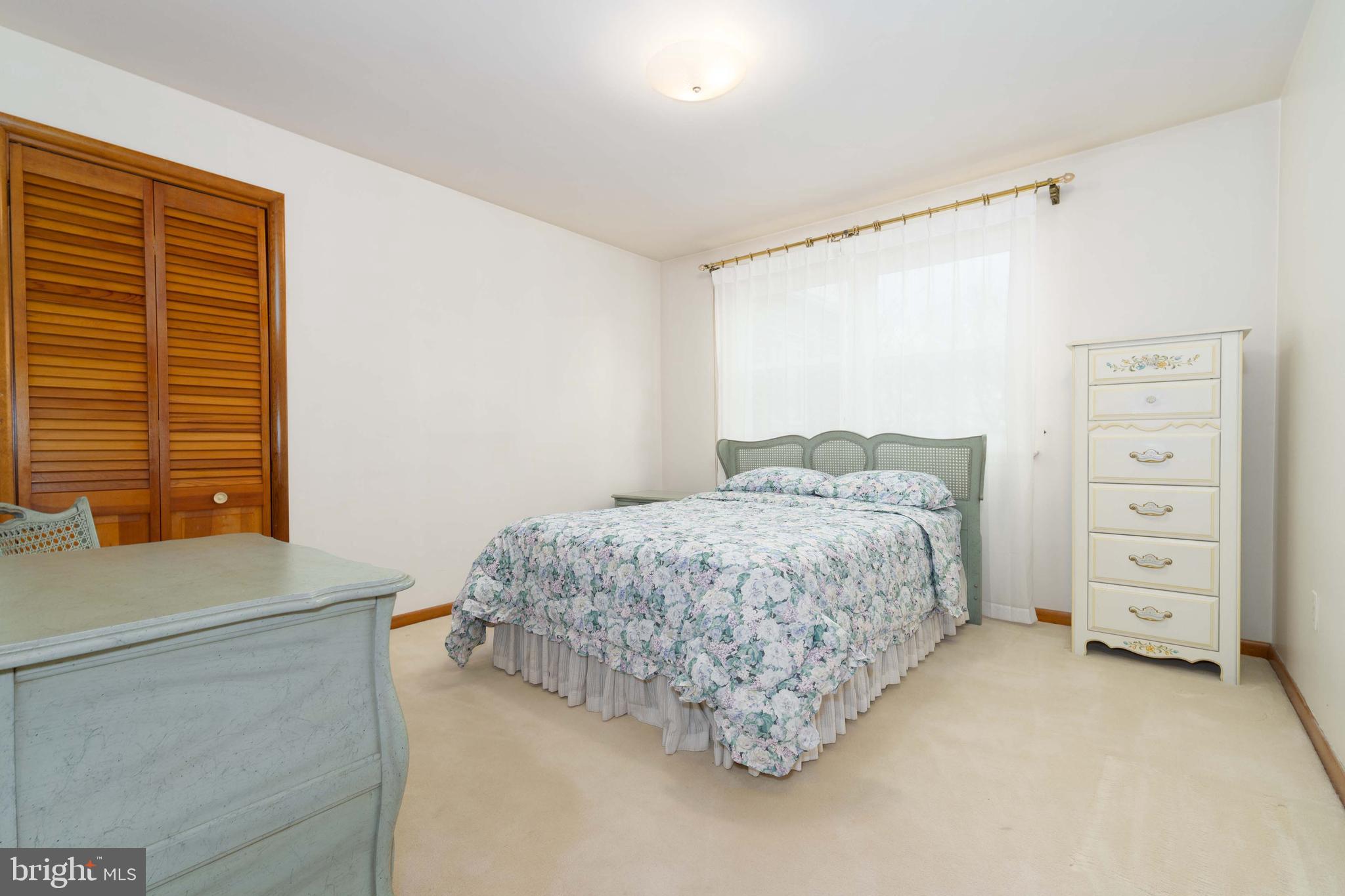 3881 Elder Road Harrisburg, PA 17111 - Photo 22 of 34 a bedroom with a bed and a window