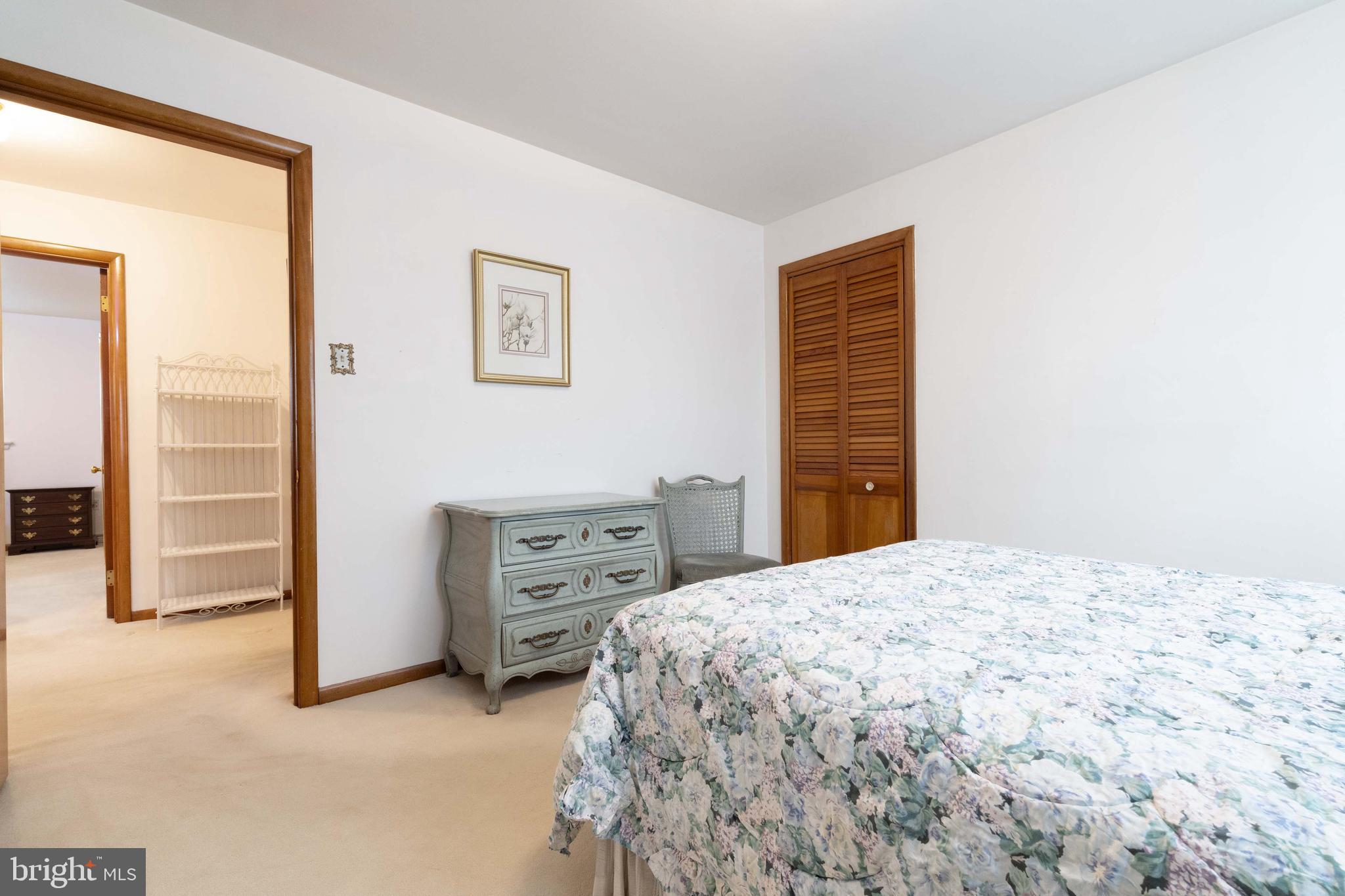 3881 Elder Road Harrisburg, PA 17111 - Photo 23 of 34 a bedroom with a bed and dresser