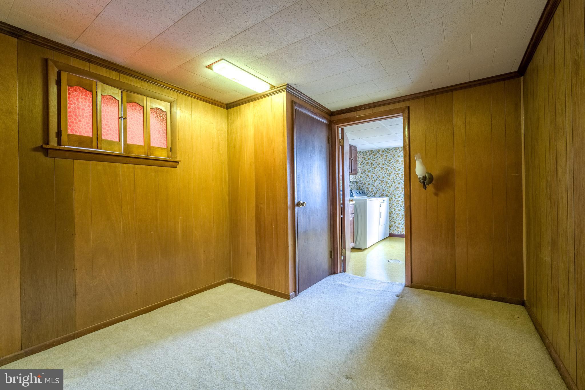 3881 Elder Road Harrisburg, PA 17111 - Photo 31 of 34 a view of a big room with wooden floor and windows