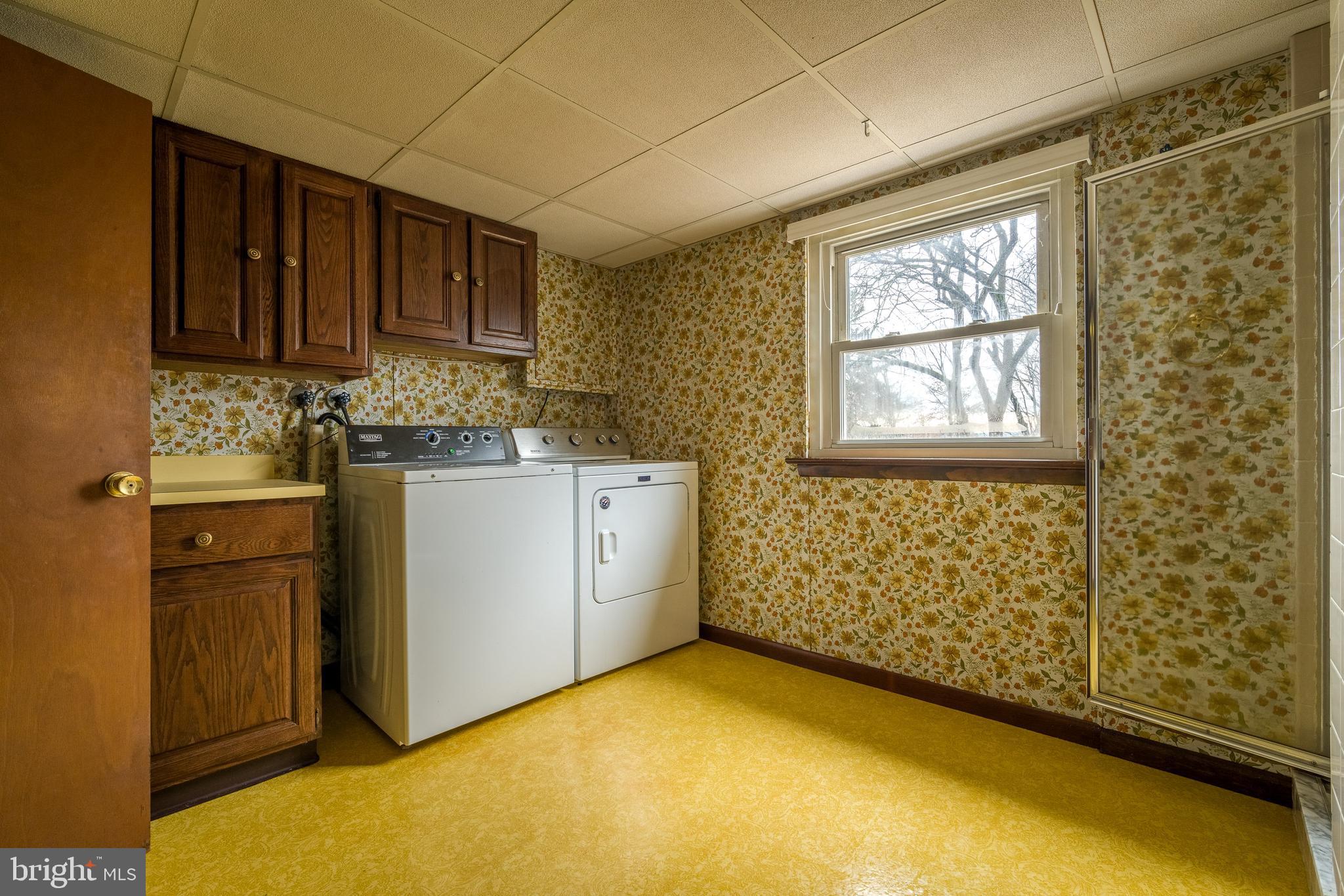 3881 Elder Road Harrisburg, PA 17111 - Photo 34 of 34 a kitchen with a sink stove and cabinets