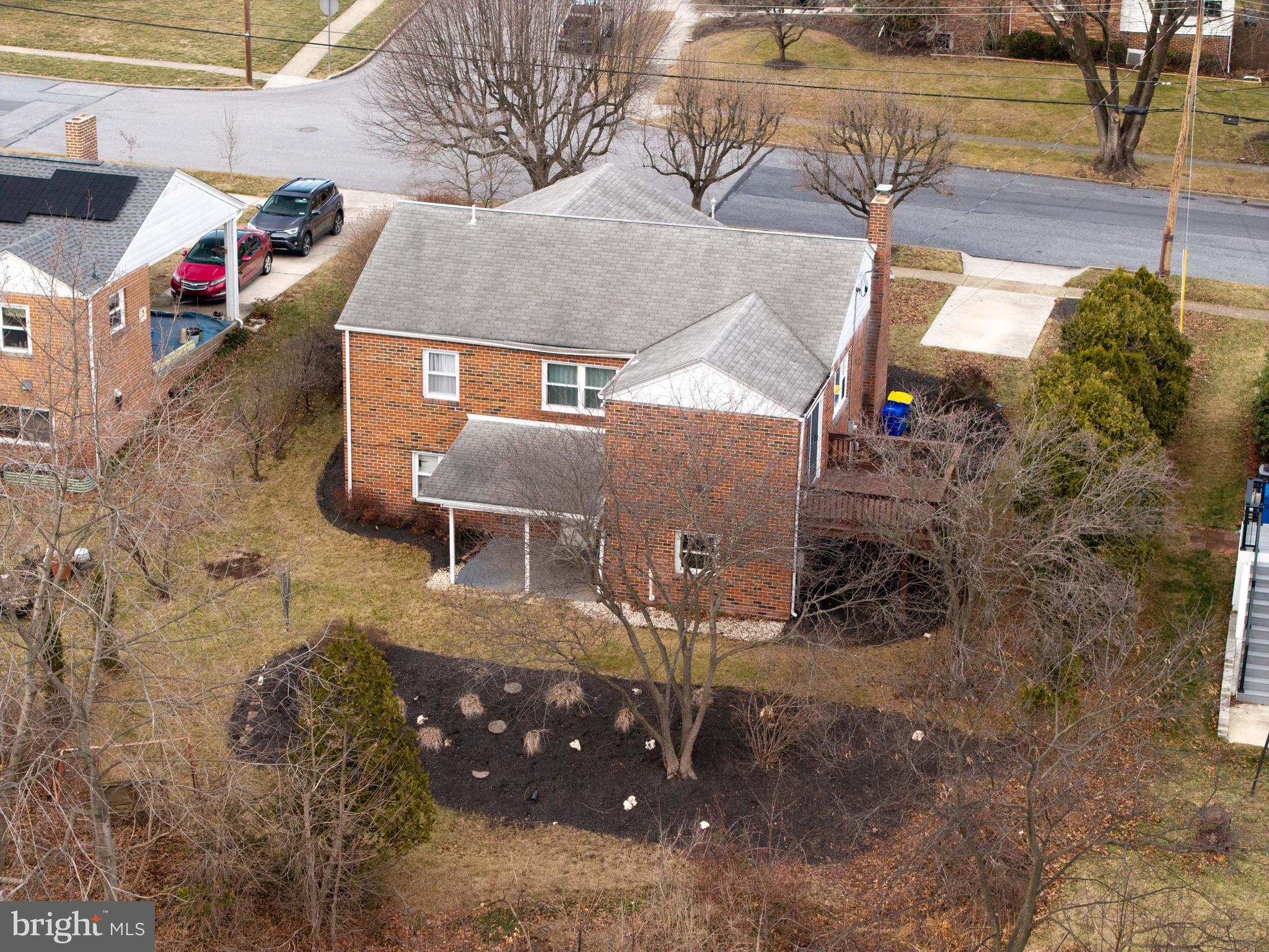 3881 Elder Road Harrisburg, PA 17111 - Photo 5 of 34 a view of a house with a backyard