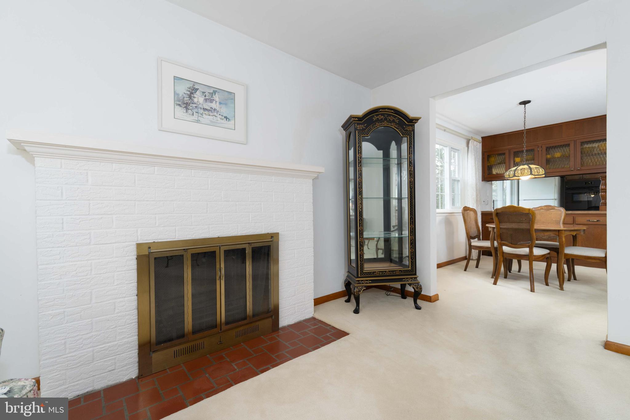 3881 Elder Road Harrisburg, PA 17111 - Photo 10 of 34 a living room with furniture and a fireplace