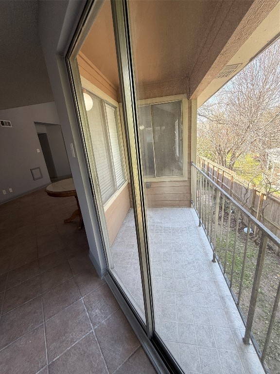 12200 Overbrook Lane, Unit 34D Houston, TX 77077 - Photo 8 of 19 a view of a hallway with wooden floor and stairs