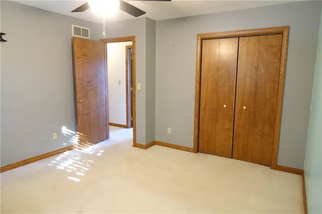 a bathroom with a bathtub and a toilet