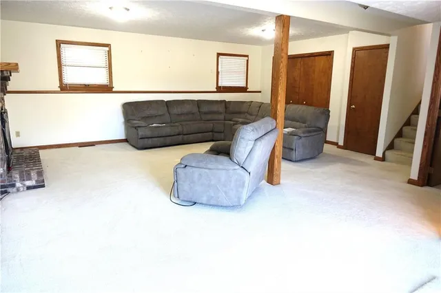 a view of a patio with table and chairs and potted plants