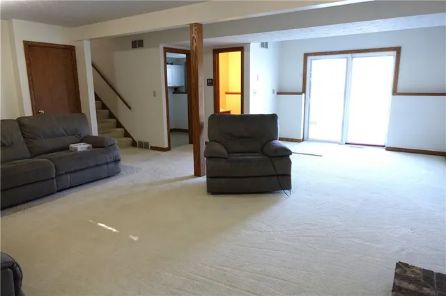 a view of a backyard with a bench