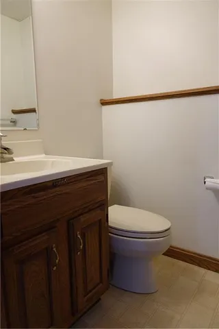 a bathroom with a sink and a window