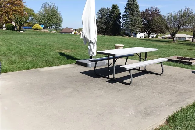 a view of empty room with wooden walls