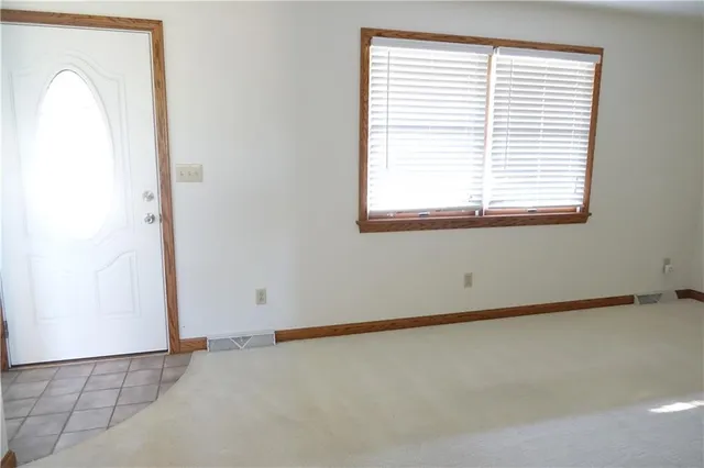 an empty room with a window