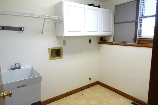 a view of a room with many windows