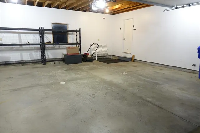 a view of grassy field with benches