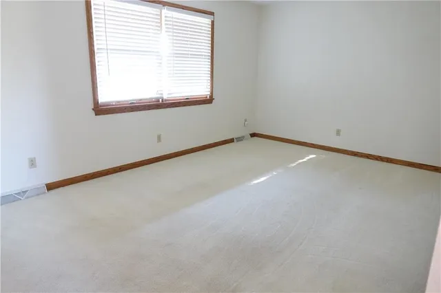 an empty room with a window