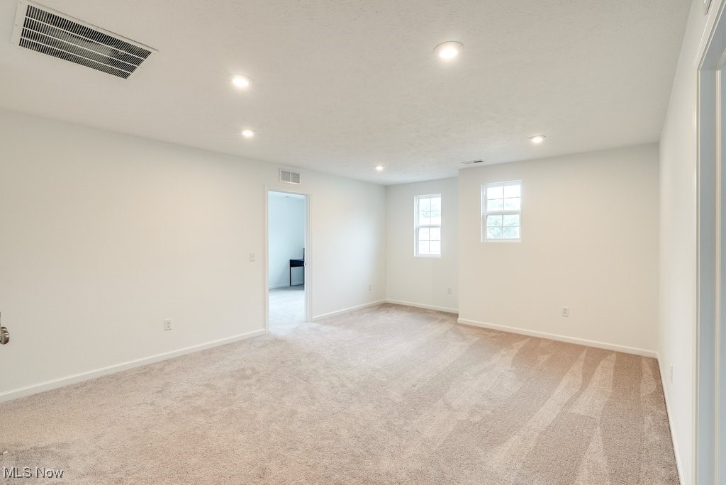 765 River Run Road Aurora, OH 44202 - Photo 20 of 35 Spare room with light carpet
