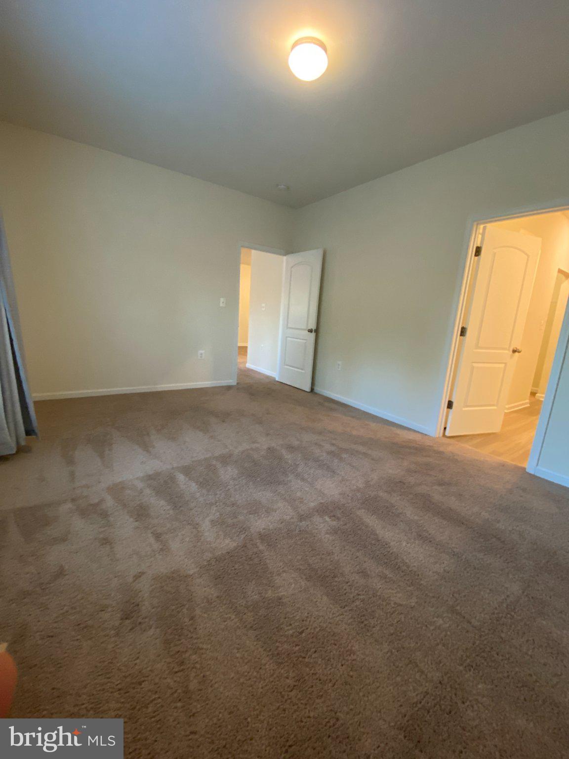 697 Rivanna Run Falling Waters, WV 25419 - Photo 42 of 44 en empty room with windows