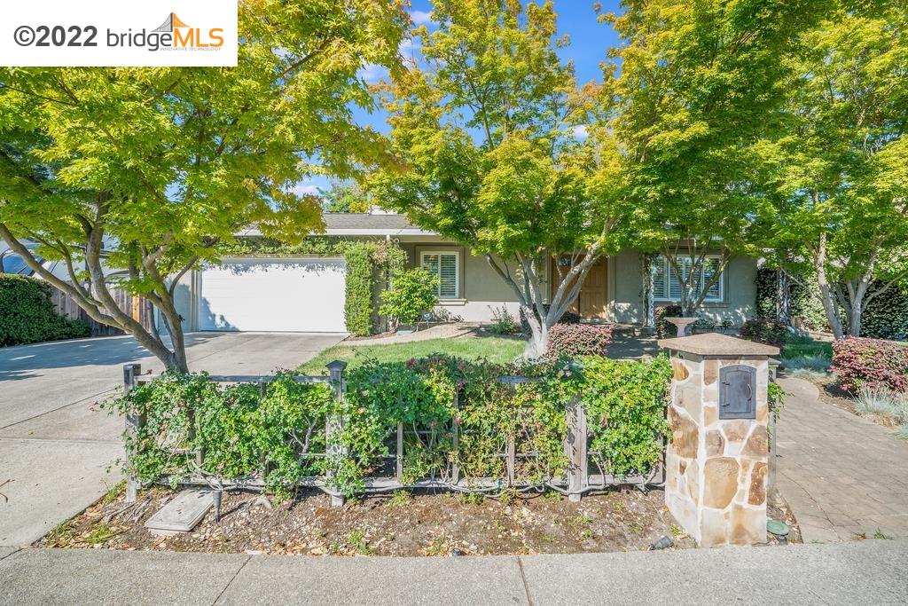 2575 Dos Rios Drive San Ramon, CA 94583 - Photo 1 of 1 a front view of a house with a garden