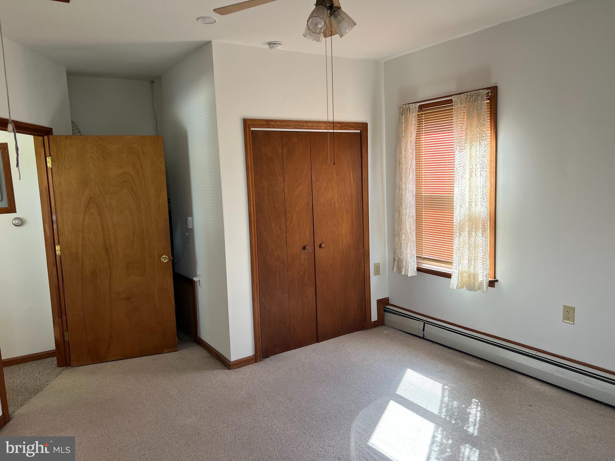 132 Main Street Mantua, NJ 08051 - Photo 9 of 15 a view of an empty room with a window