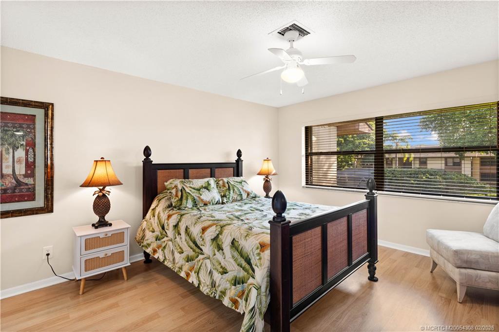 4885 Southeast Capstan Avenue, Unit 27 Stuart, FL 34997 - Photo 21 of 40 Queen bed in Primary bedroom,