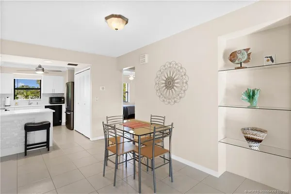 a view of a dining room with furniture